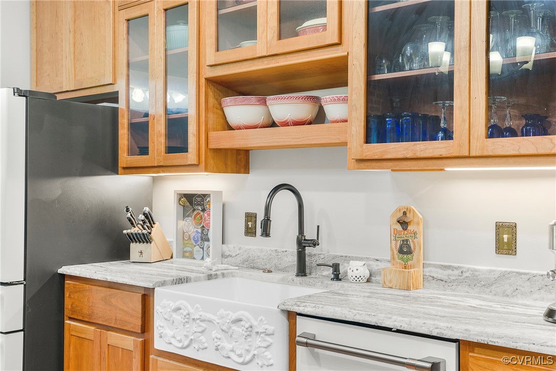 504 Springbranch Road Lexington, VA 24450 - Photo 25 of 50 a kitchen with granite countertop a sink and cabinets