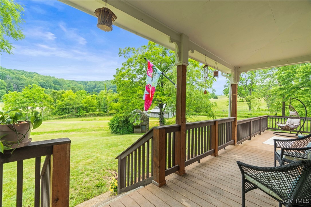 504 Springbranch Road Lexington, VA 24450 - Photo 40 of 50 a view of a patio with two couches chairs and wooden floor