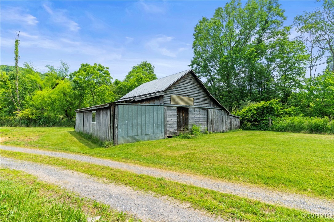 504 Springbranch Road Lexington, VA 24450 - Photo 46 of 50 a view of a big house with a big yard and large trees
