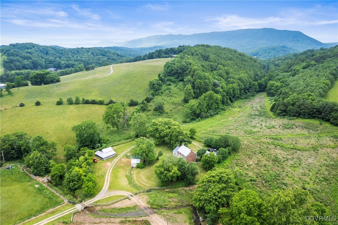 504 Springbranch Road Lexington, VA 24450 - Photo 10 of 50 a view of a lush green hillside and houses