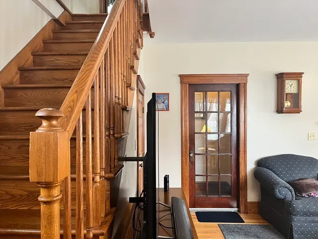 a view of a balcony and wooden floor