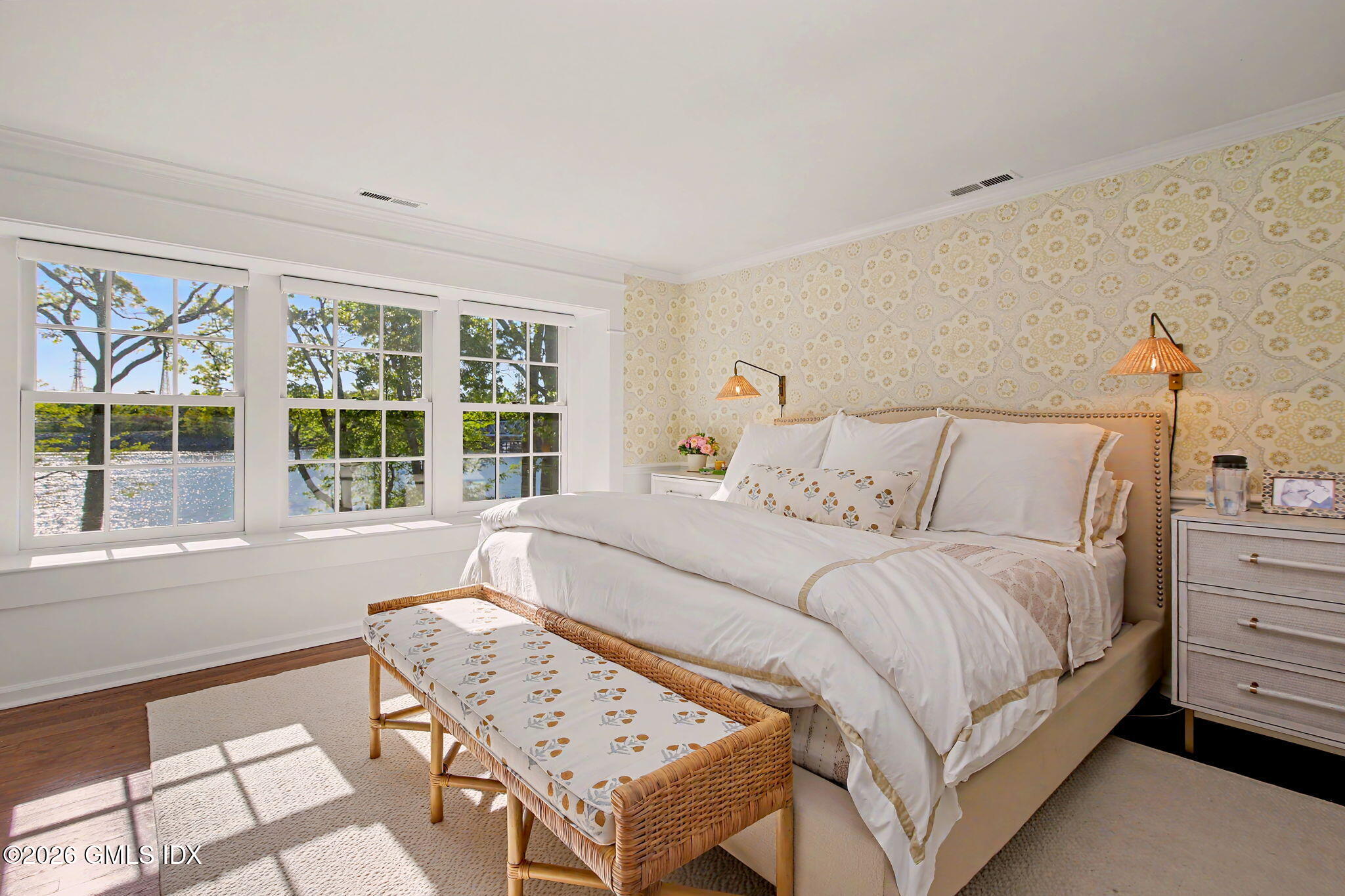 10 Newton Street Riverside, CT 06878 - Photo 15 of 28 a bedroom with a bed a dresser and a large window