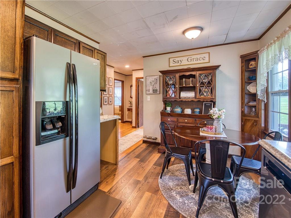 1239 Beaverdam Road Canton, NC 28716 - Photo 24 of 30 a view of a dining room with furniture