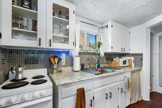 a bedroom with a workspace