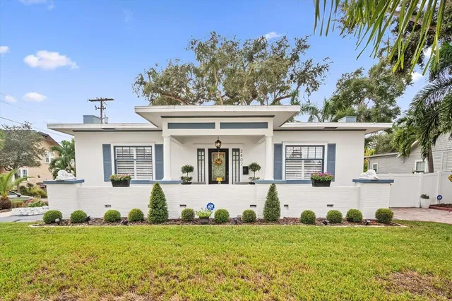 front view of a house with a yard