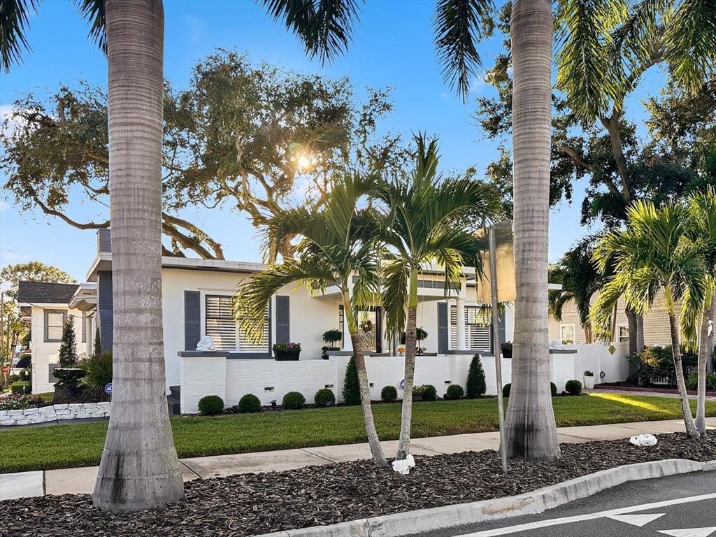 2402 North Ridgewood Avenue Tampa, FL 33602 - Photo 6 of 56 a front view of a house with garden