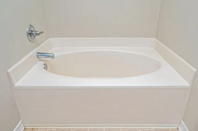 a bathroom with a bathtub