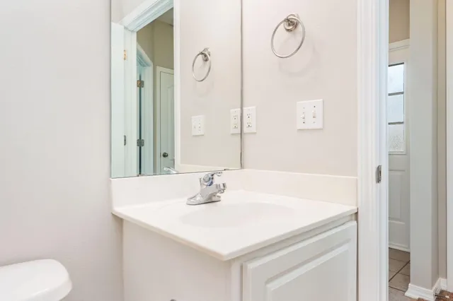 a view of room that has a bed