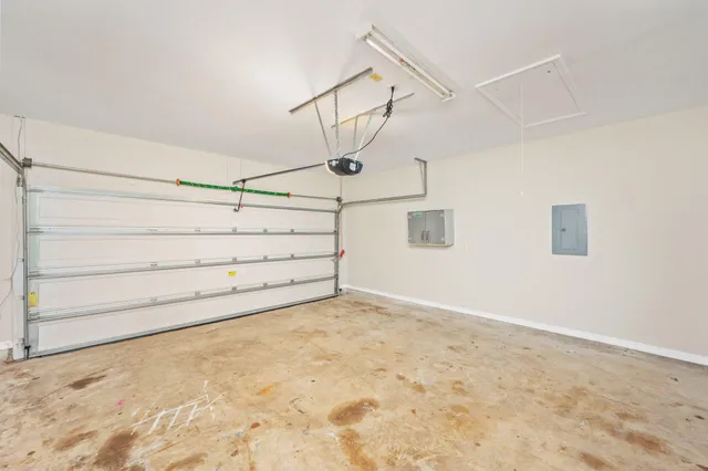 a house view with a sitting space and garden