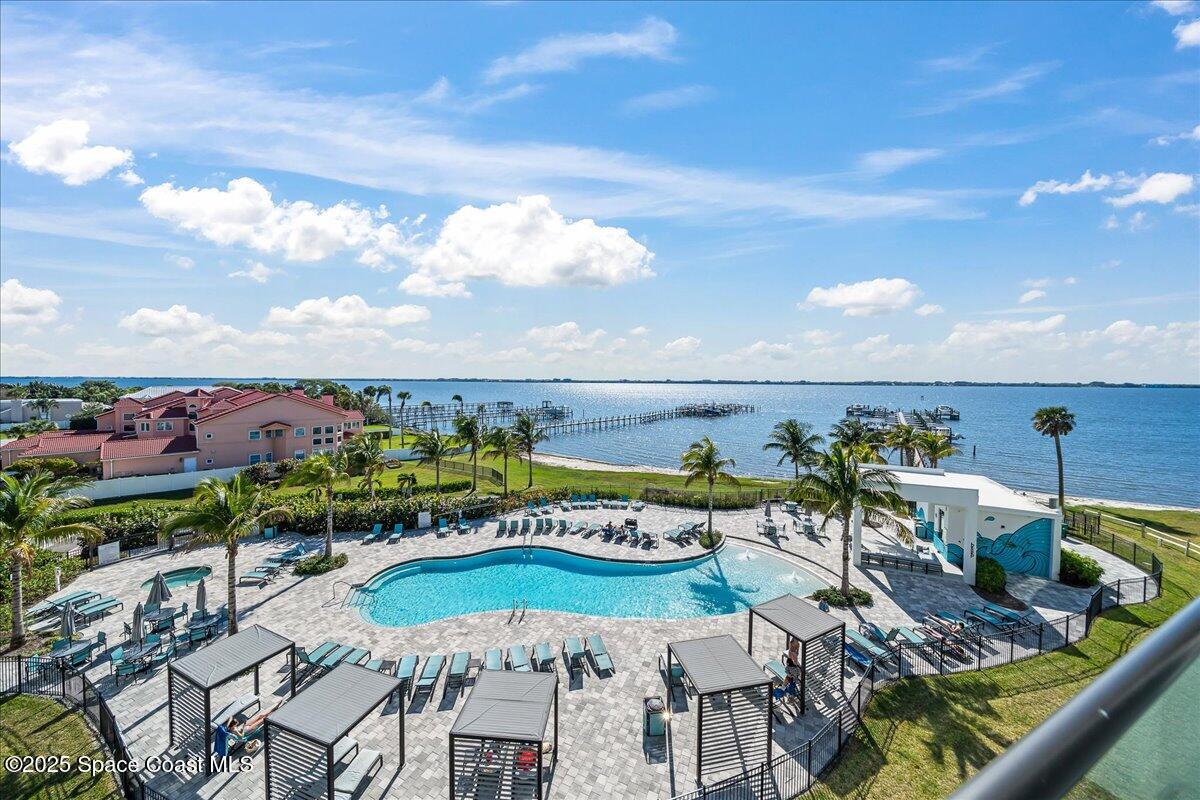 225 Strand Drive, Unit 401 Melbourne Beach, FL 32951 - Photo 19 of 51 a view of a city with furniture