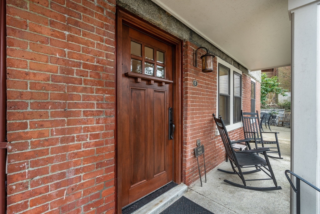 101 Summit Avenue, Unit E Brookline, MA 02446 - Photo 4 of 22 a view of a brick wall