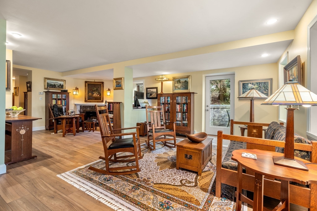 101 Summit Avenue, Unit E Brookline, MA 02446 - Photo 6 of 22 a living room with furniture and wooden floor