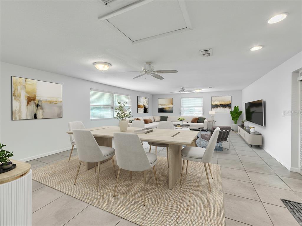 3509 King George Lane Seffner, FL 33584 - Photo 12 of 39 a view of a dining room with furniture