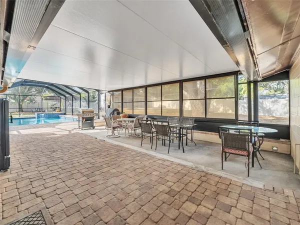 a view of a dining room with furniture water view and mountain view