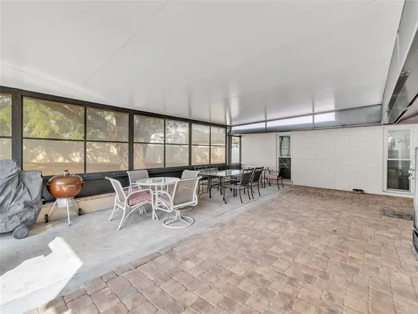 a view of a dining area with furniture window and outside view