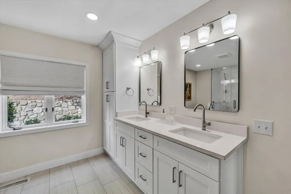 a bedroom with furniture and a bed