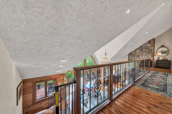 a view of a back yard from a balcony