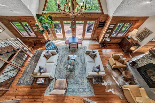 a house with wooden floor and outdoor space