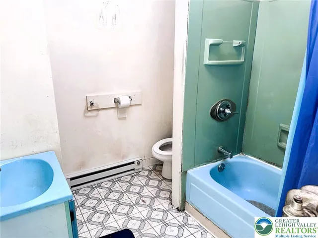 a bathroom with a sink and a tub