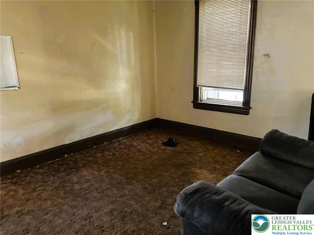 37 South 7th Street Easton, PA 18042 - Photo 19 of 23 a living room with furniture and a window