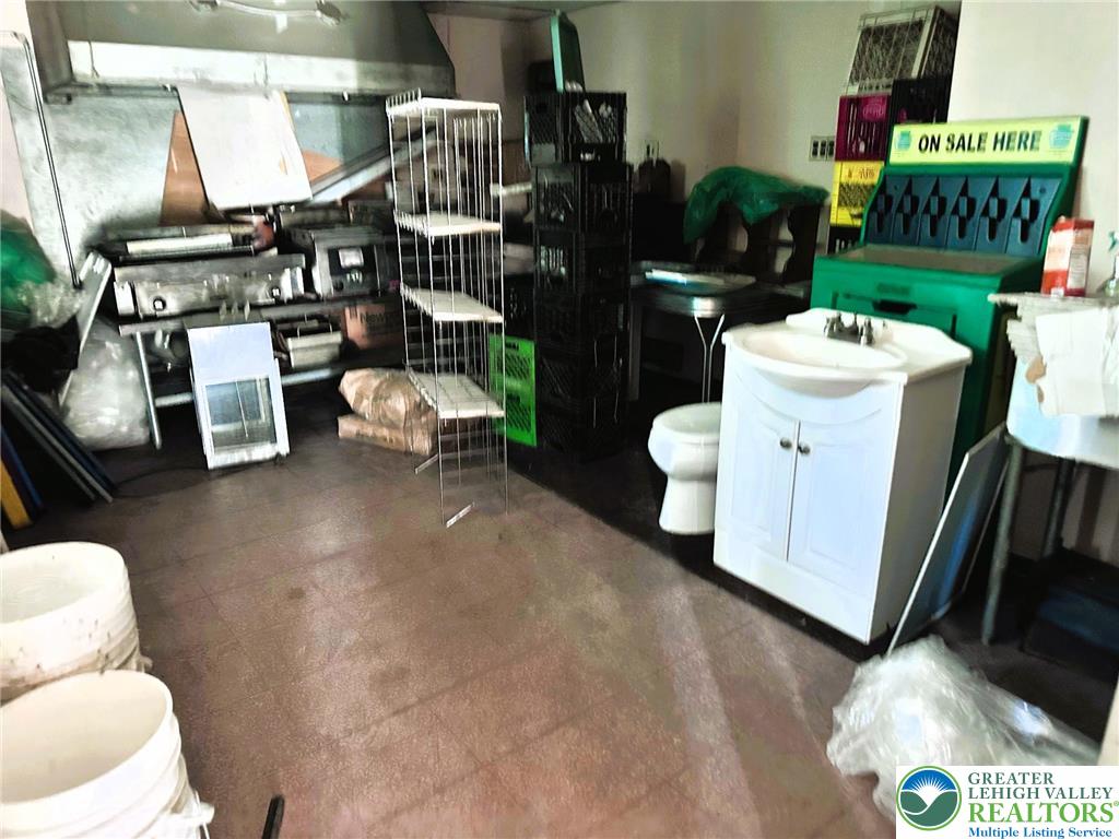 37 South 7th Street Easton, PA 18042 - Photo 23 of 23 a living room with lots of furniture and a fireplace