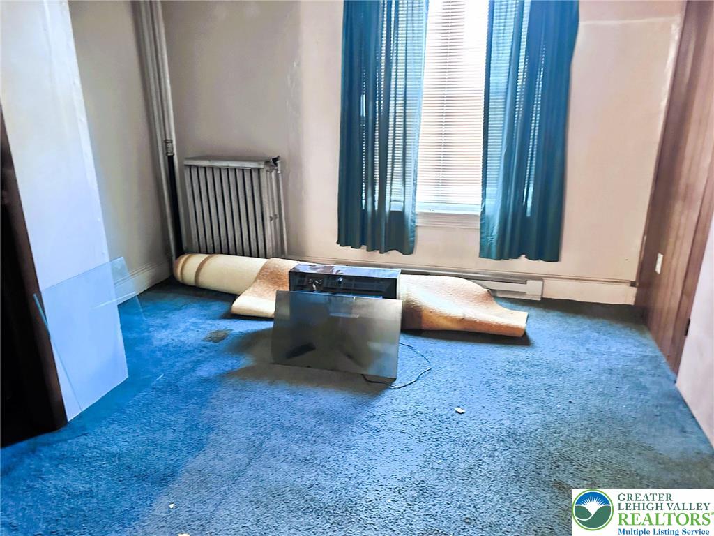 37 South 7th Street Easton, PA 18042 - Photo 7 of 23 a living room with furniture and a window