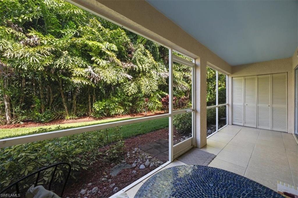 338 Bradstrom Circle, Unit 102 Naples, FL 34113 - Photo 16 of 21 a view of outdoor space with backyard