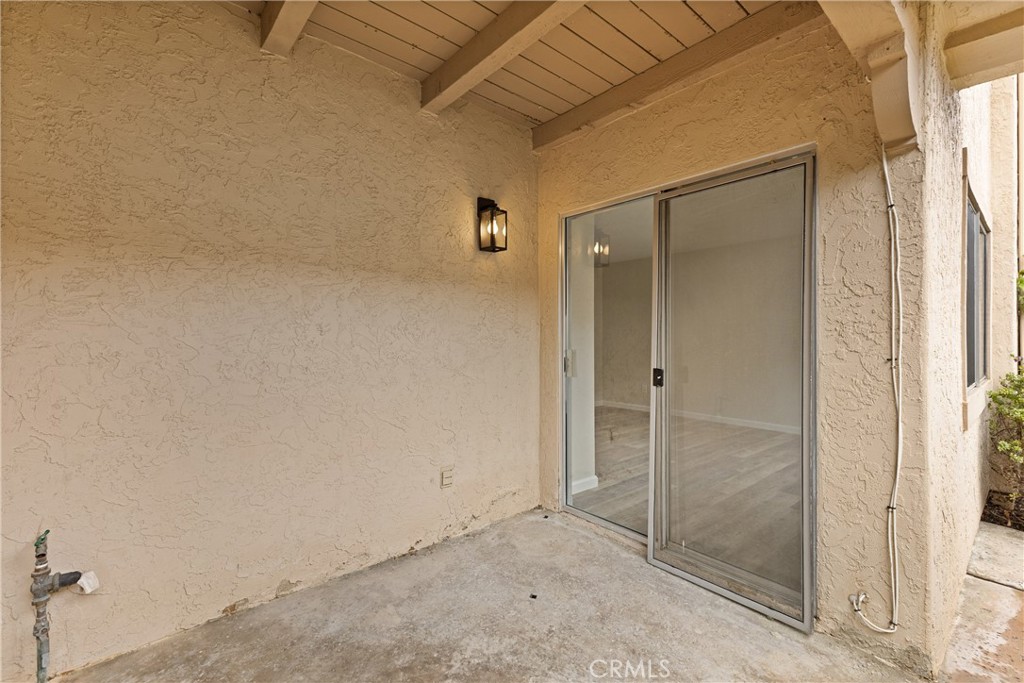 2352 Altisma Way, Unit 4 Carlsbad, CA 92009 - Photo 30 of 32 Downstair back patio