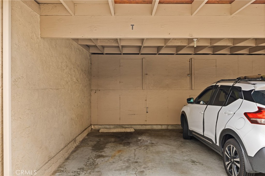 2352 Altisma Way, Unit 4 Carlsbad, CA 92009 - Photo 31 of 32 Garage with storage