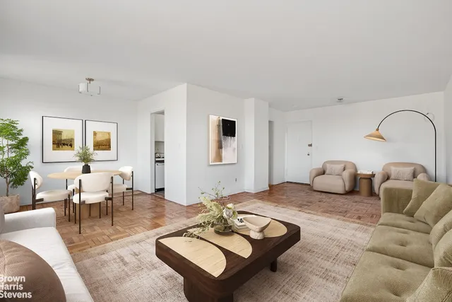 a view of a room with an empty space and a window