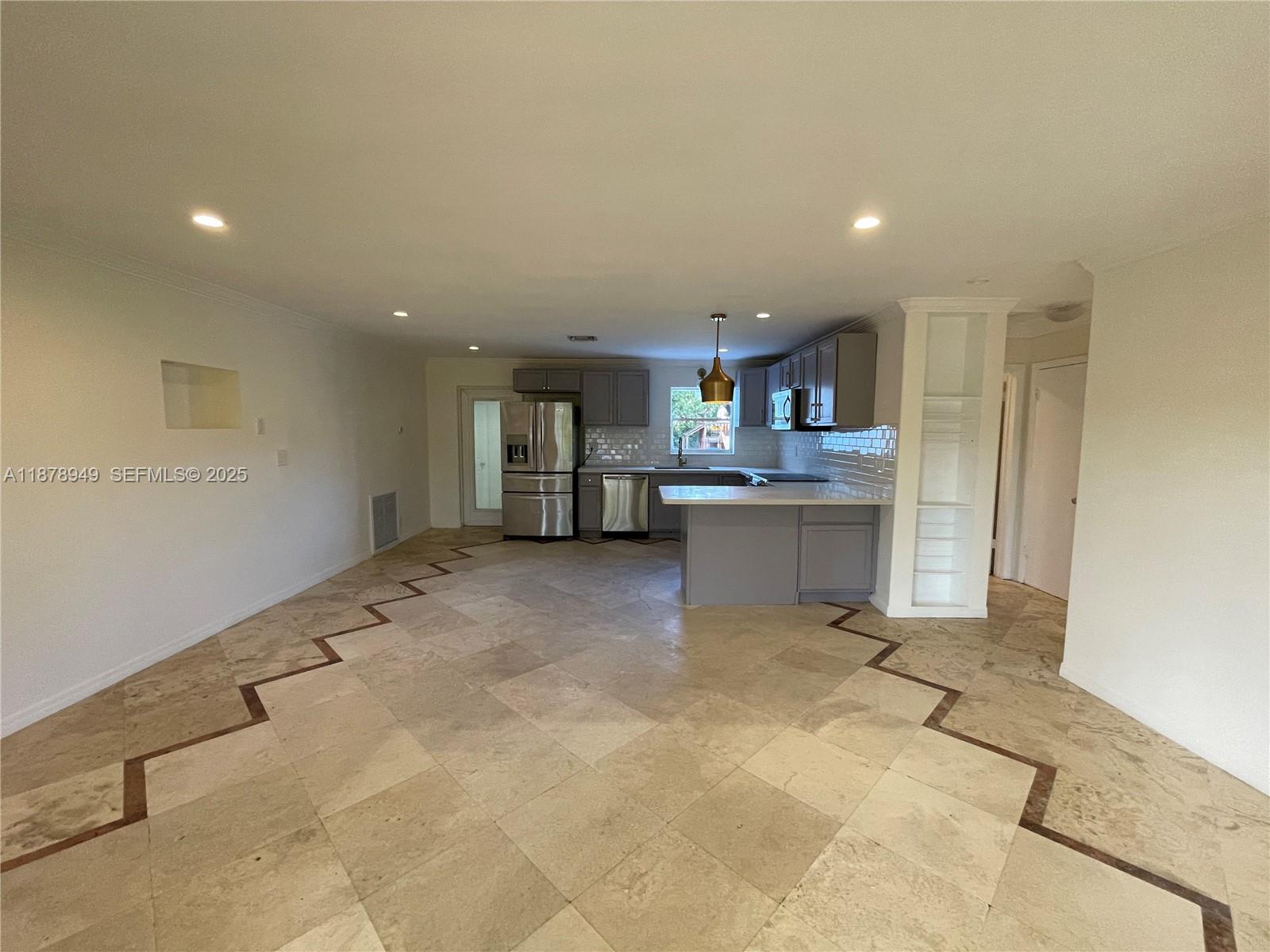 a view of a kitchen with a sink