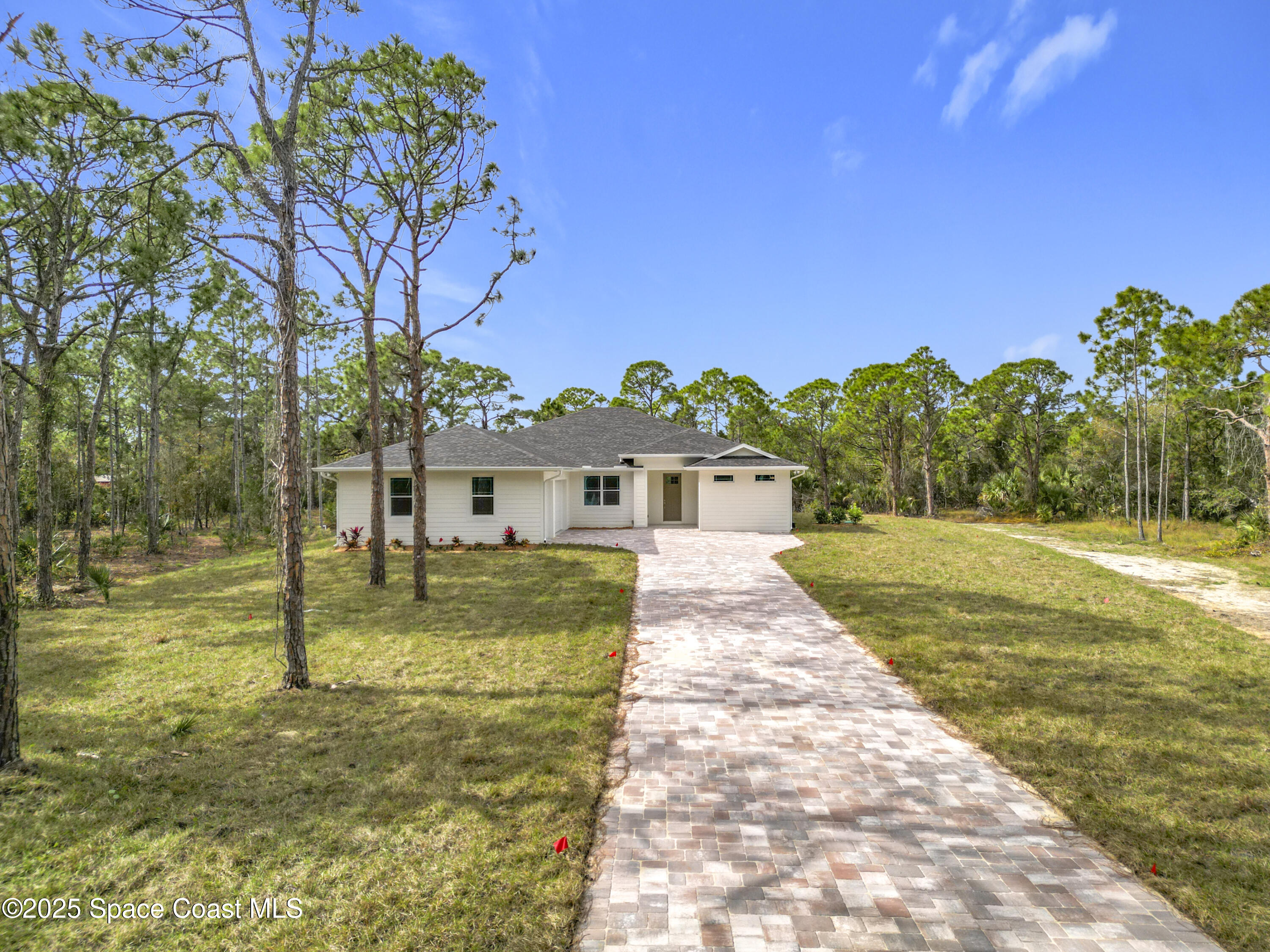 6110 Brabrook Avenue Grant, FL 32949 - Photo 1 of 85 a view of a house with a yard