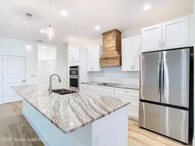 a view of a lake with a city