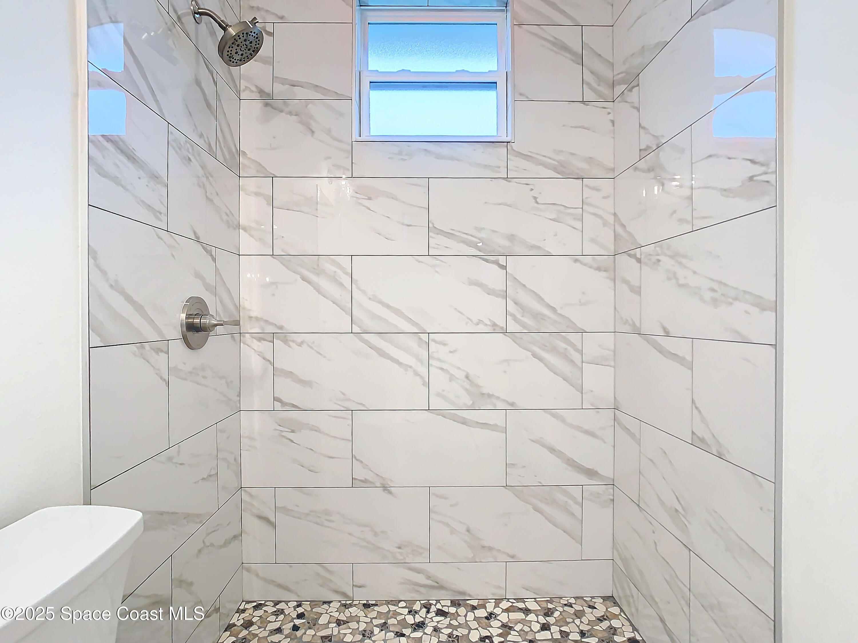 6110 Brabrook Avenue Grant, FL 32949 - Photo 37 of 85 a bathroom with a shower