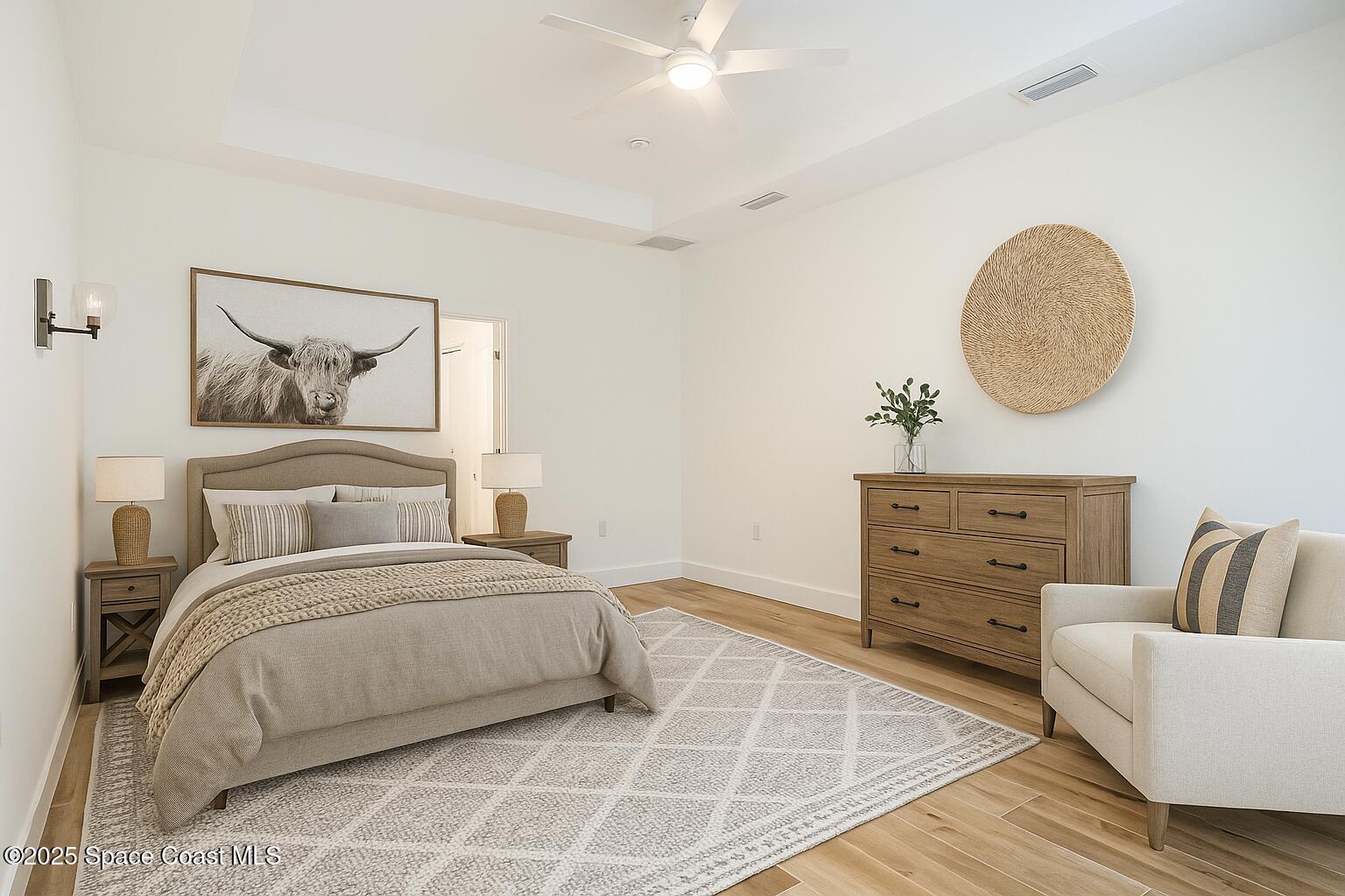 6110 Brabrook Avenue Grant, FL 32949 - Photo 43 of 85 a bedroom with a bed and closet with mirror