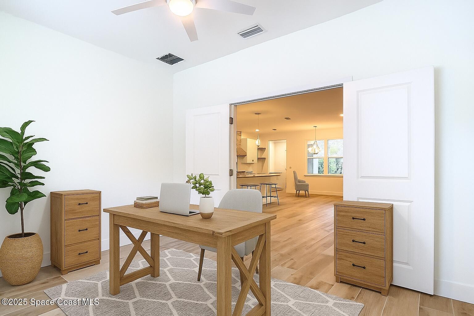 6110 Brabrook Avenue Grant, FL 32949 - Photo 47 of 85 a room with furniture and a window