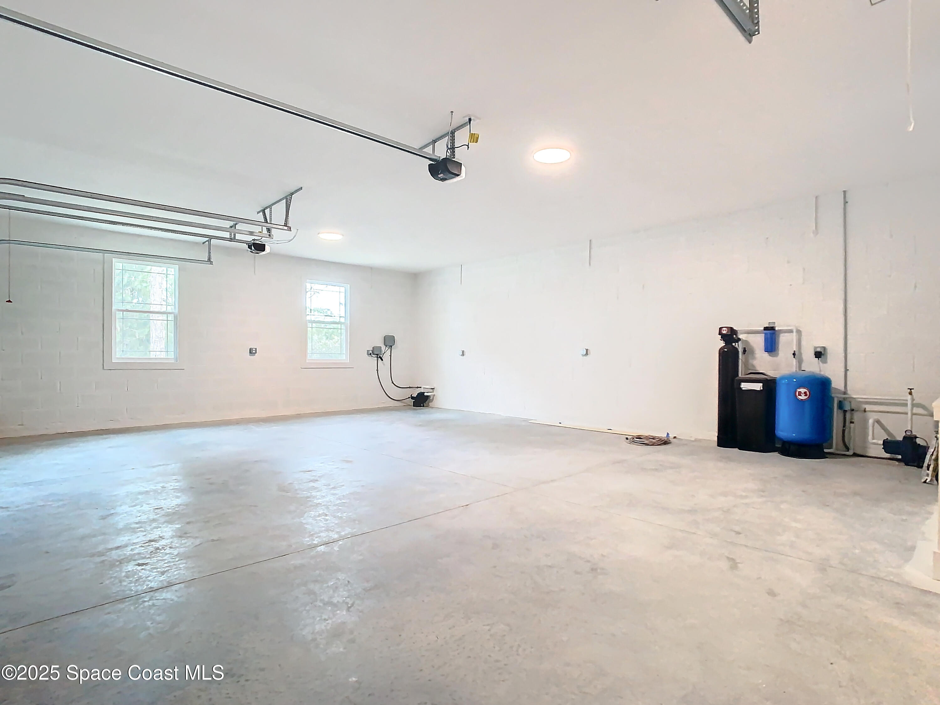 6110 Brabrook Avenue Grant, FL 32949 - Photo 58 of 85 an empty room with windows and ceiling fan