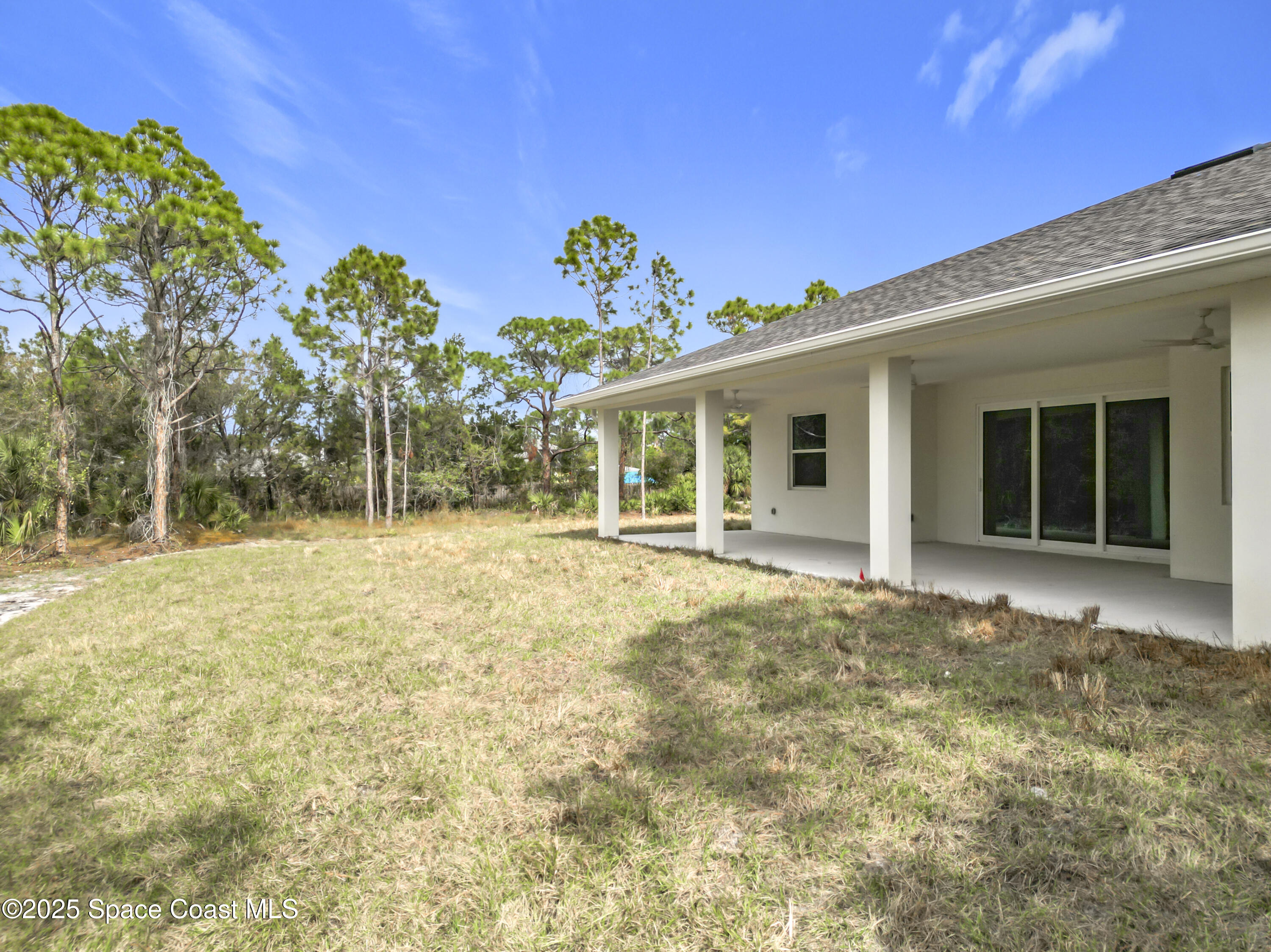 6110 Brabrook Avenue Grant, FL 32949 - Photo 72 of 85 a view of a house with a backyard