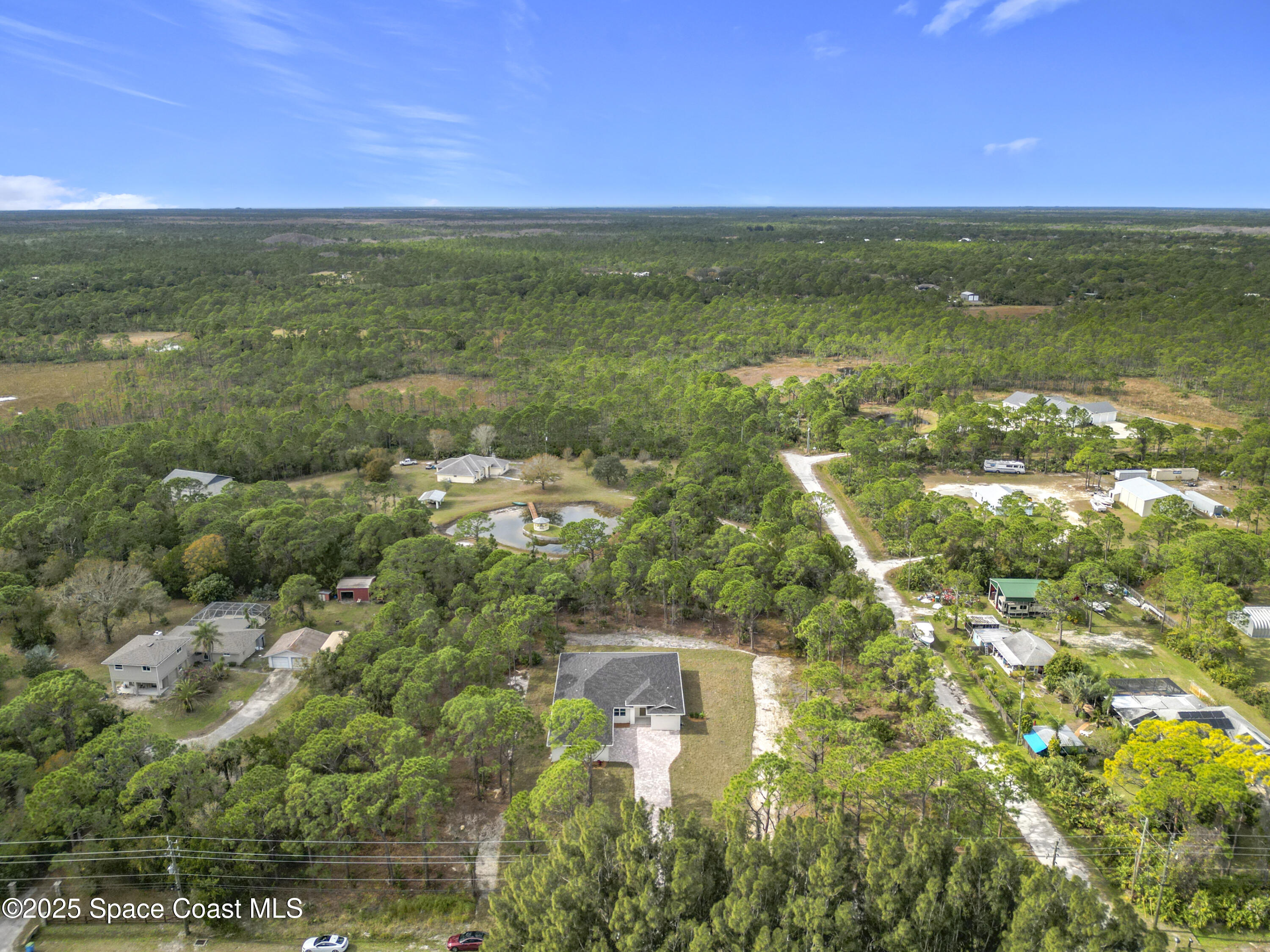 6110 Brabrook Avenue Grant, FL 32949 - Photo 74 of 85 a view of a lake with a city