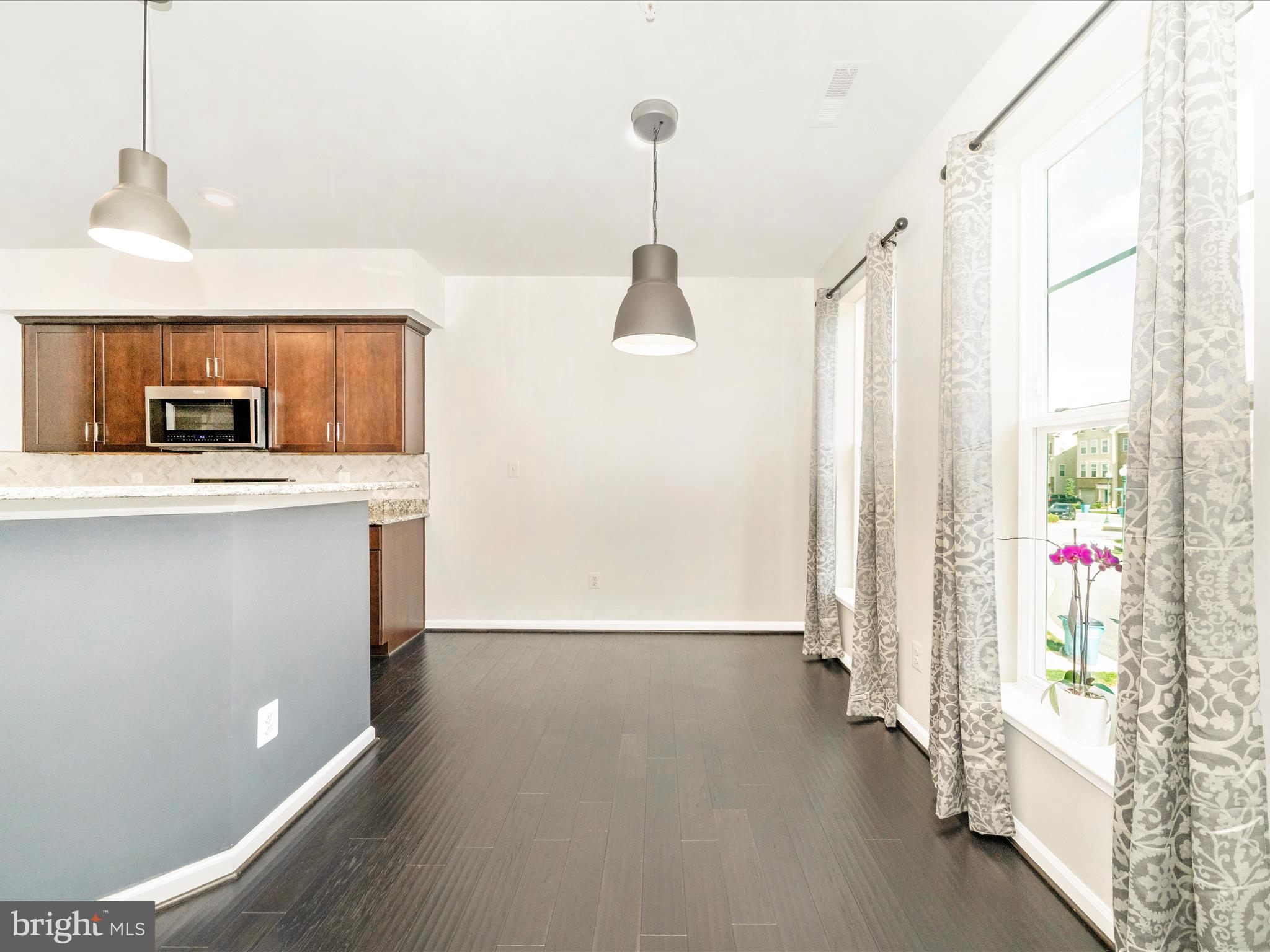 5880 Imperial Drive Frederick, MD 21703 - Photo 28 of 54 a view of a kitchen with a sink and a window