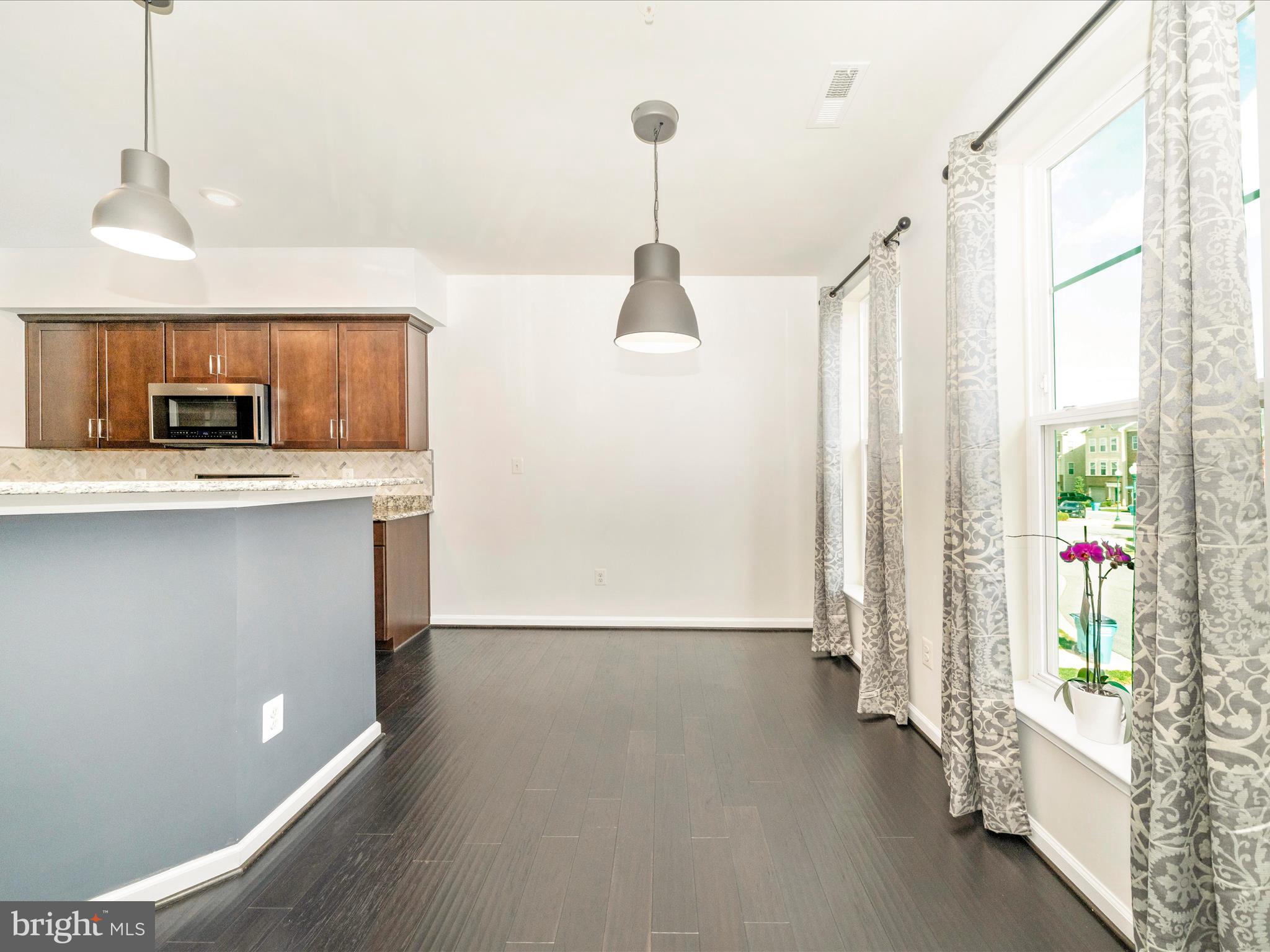 5880 Imperial Drive Frederick, MD 21703 - Photo 29 of 54 a view of a kitchen with a sink and a window