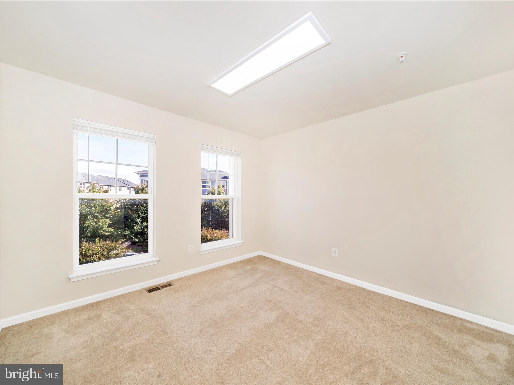 5880 Imperial Drive Frederick, MD 21703 - Photo 30 of 54 an empty room with windows
