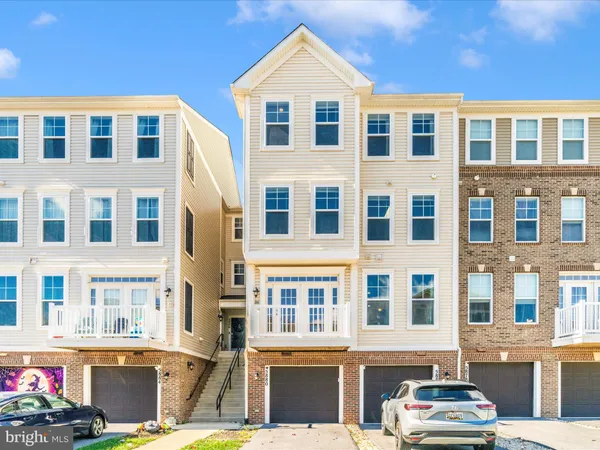 a front view of a building with a street