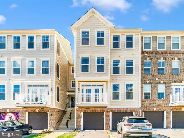 a front view of a building with a street
