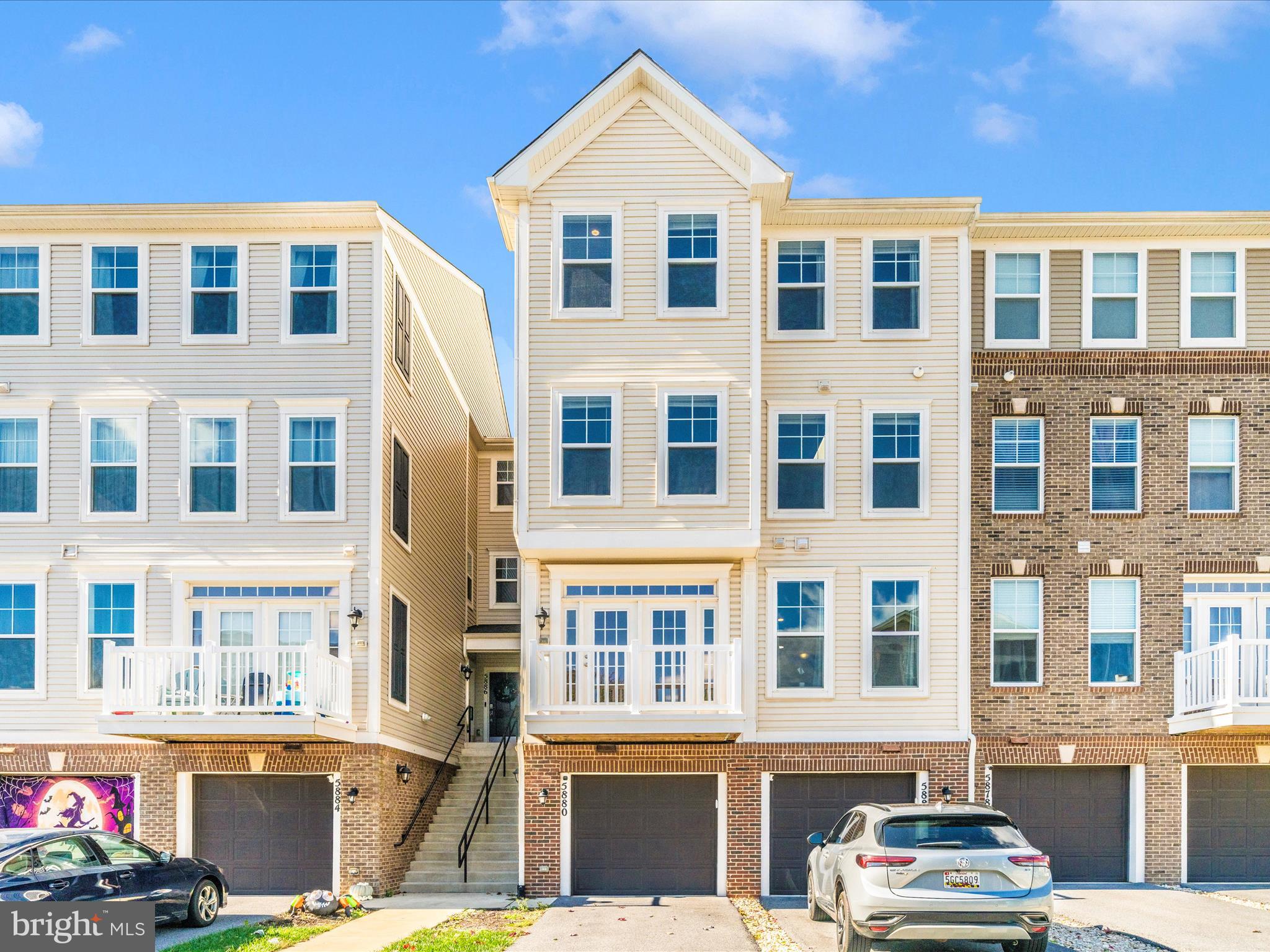 5880 Imperial Drive Frederick, MD 21703 - Photo 3 of 54 a front view of a building with a street