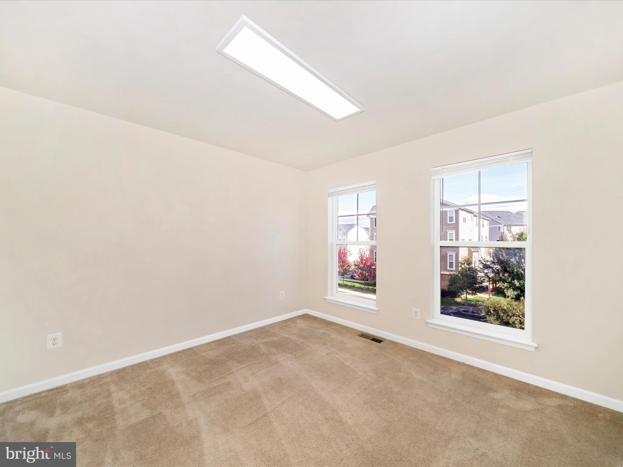 5880 Imperial Drive Frederick, MD 21703 - Photo 33 of 54 an empty room with windows