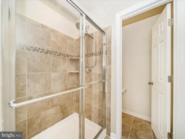 a view of hallway with livingroom