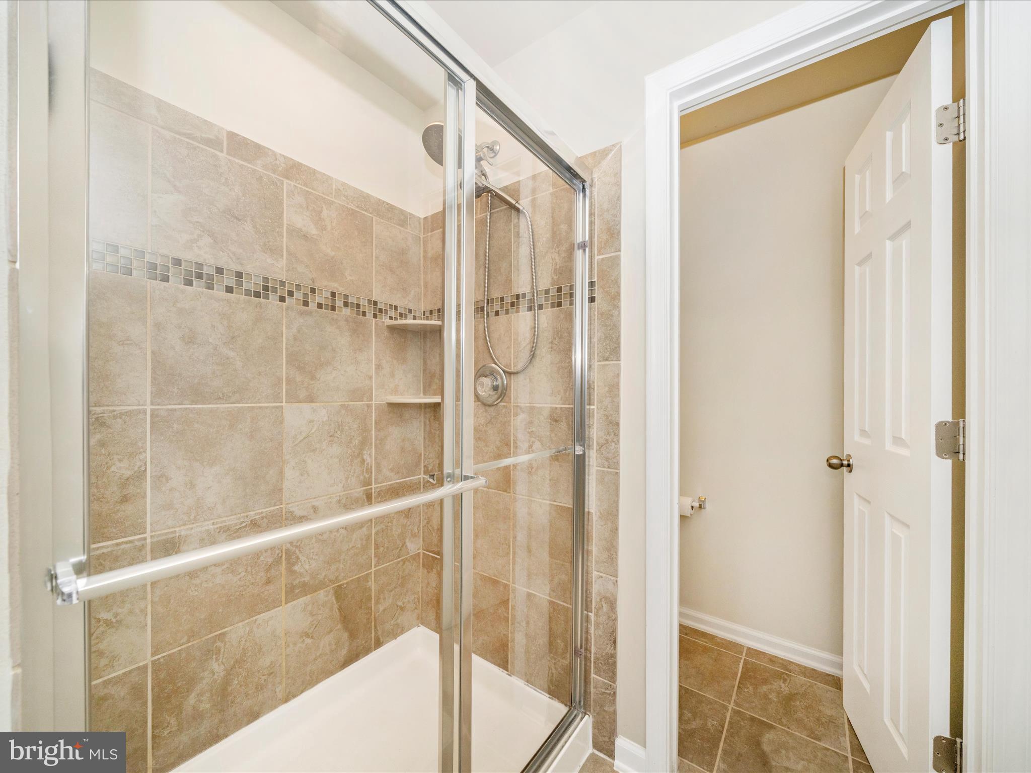 5880 Imperial Drive Frederick, MD 21703 - Photo 43 of 54 a bathroom with a shower