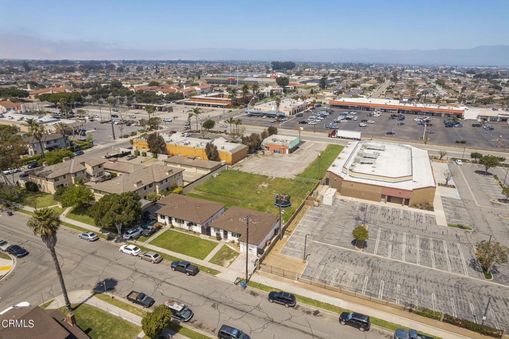 258 West Pleasant Valley Road Oxnard, CA 93033 - Photo 21 of 25 an aerial view of residential houses with outdoor space