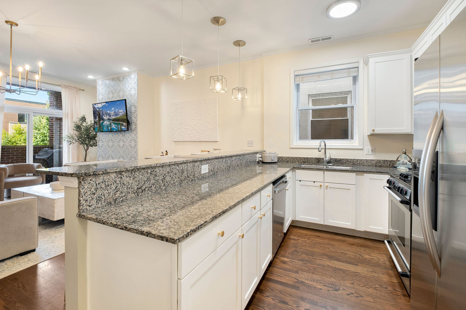 1529 West Montana Street, Unit 2 Chicago, IL 60614 - Photo 13 of 32 a kitchen with a sink refrigerator and microwave